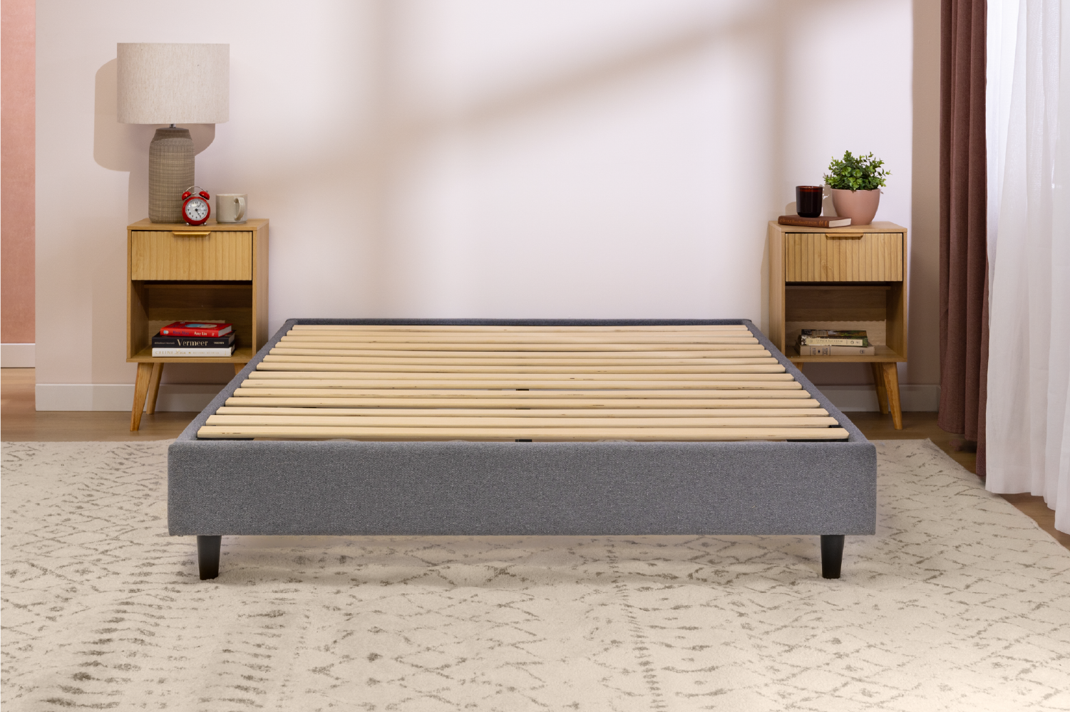 02IMGMRArticles MattressReviewsca Front angle image of a platform bed frame in a bedroom