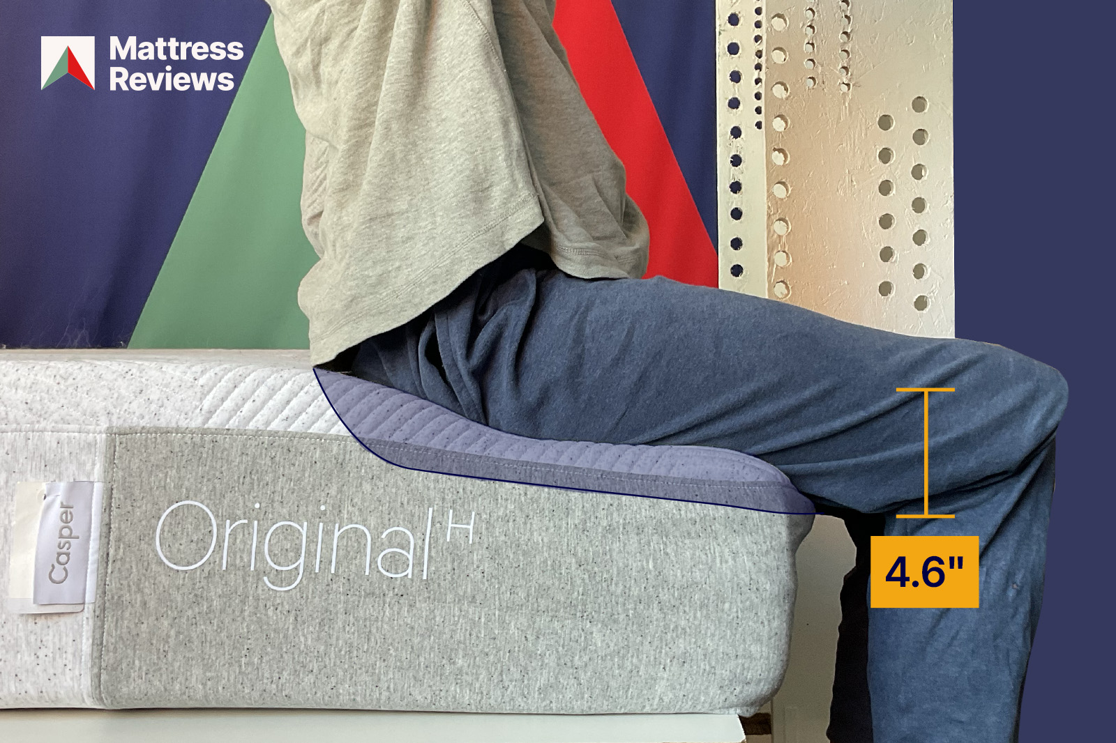 mannequin sitting on a bed showing 46