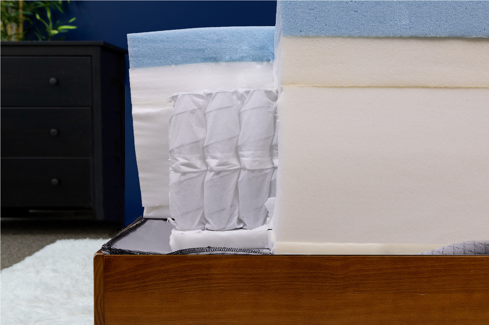 DGHybridSummitInternalsSide MattressReviewsca side view of the Douglas Summit Hybrid mattress's internal layers