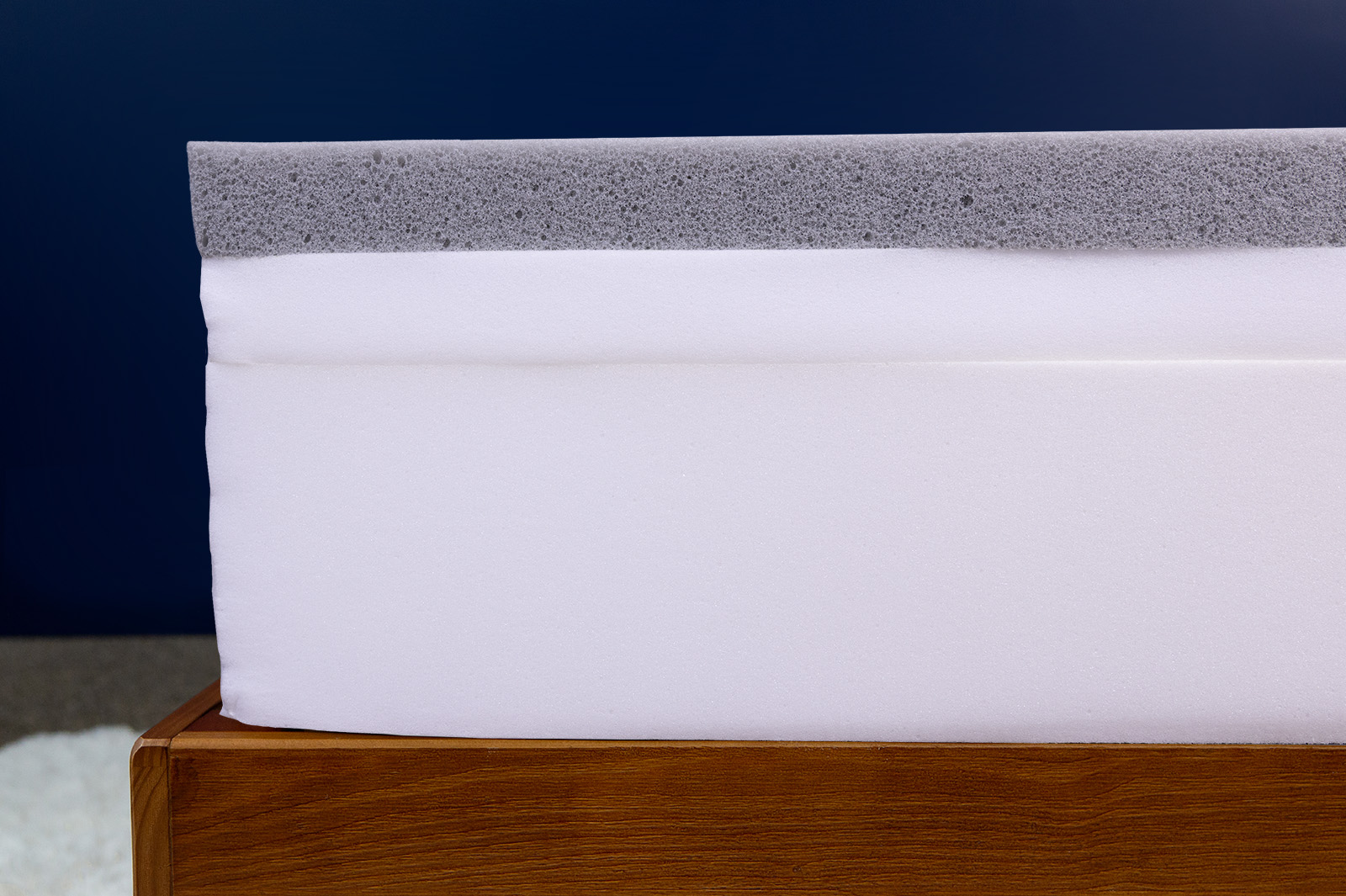 GhostbedComfortFoamInternalsSide MattressReviewsca close up side view of the internal layers of the GhostBed Comfort Foam mattress