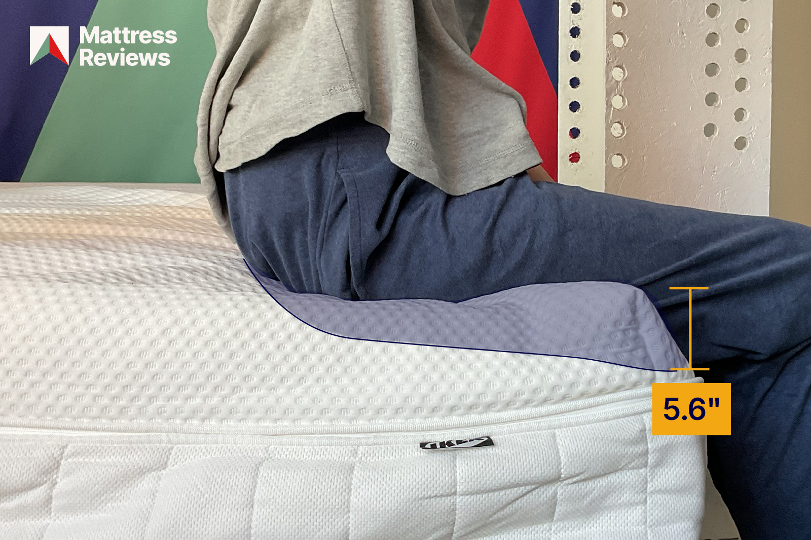 mannequin sitting on an IKEA ANNELAND mattress showing 56