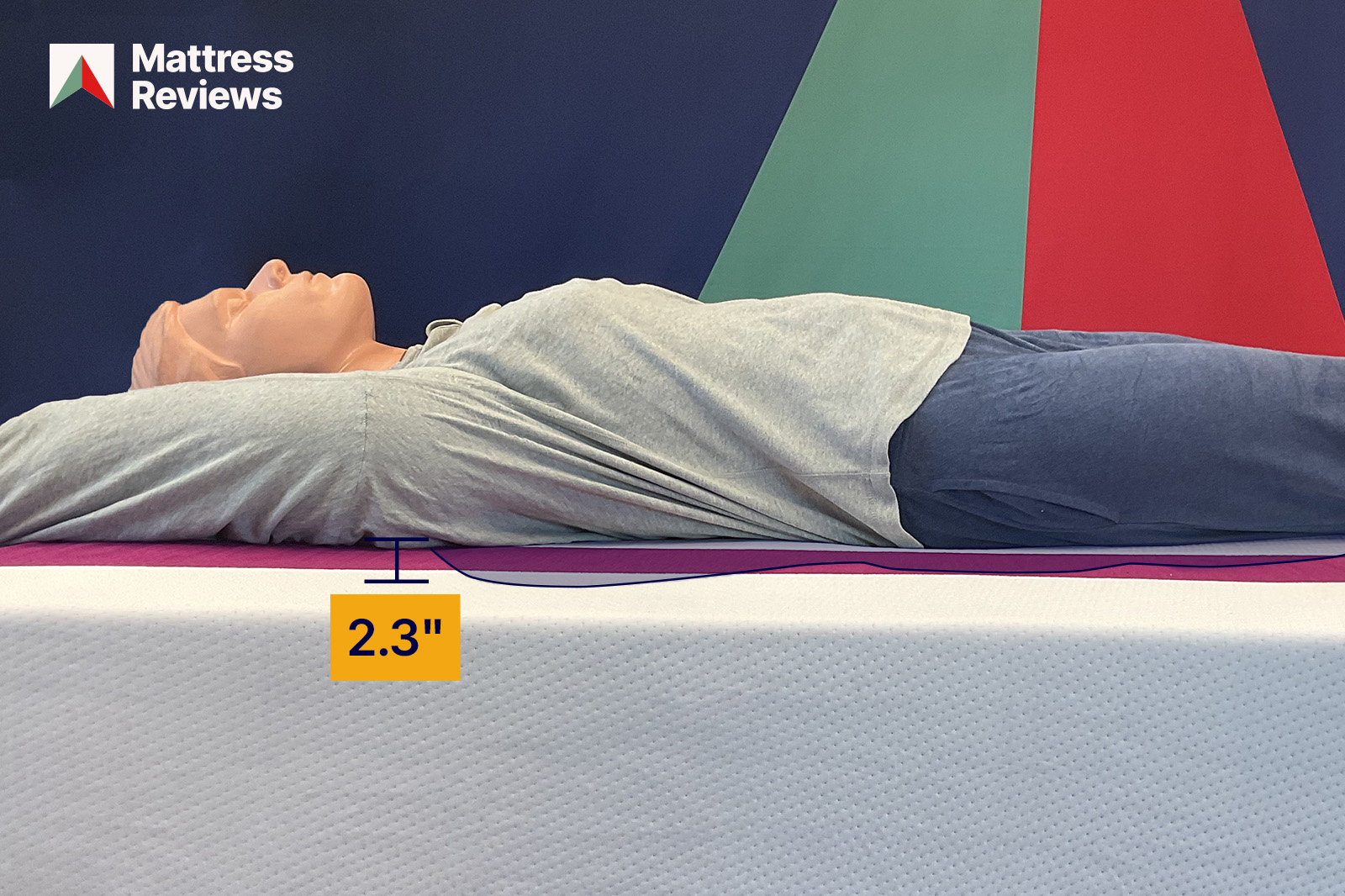 Image of a mannequin lying on a Juno Hybrid mattress showing 23