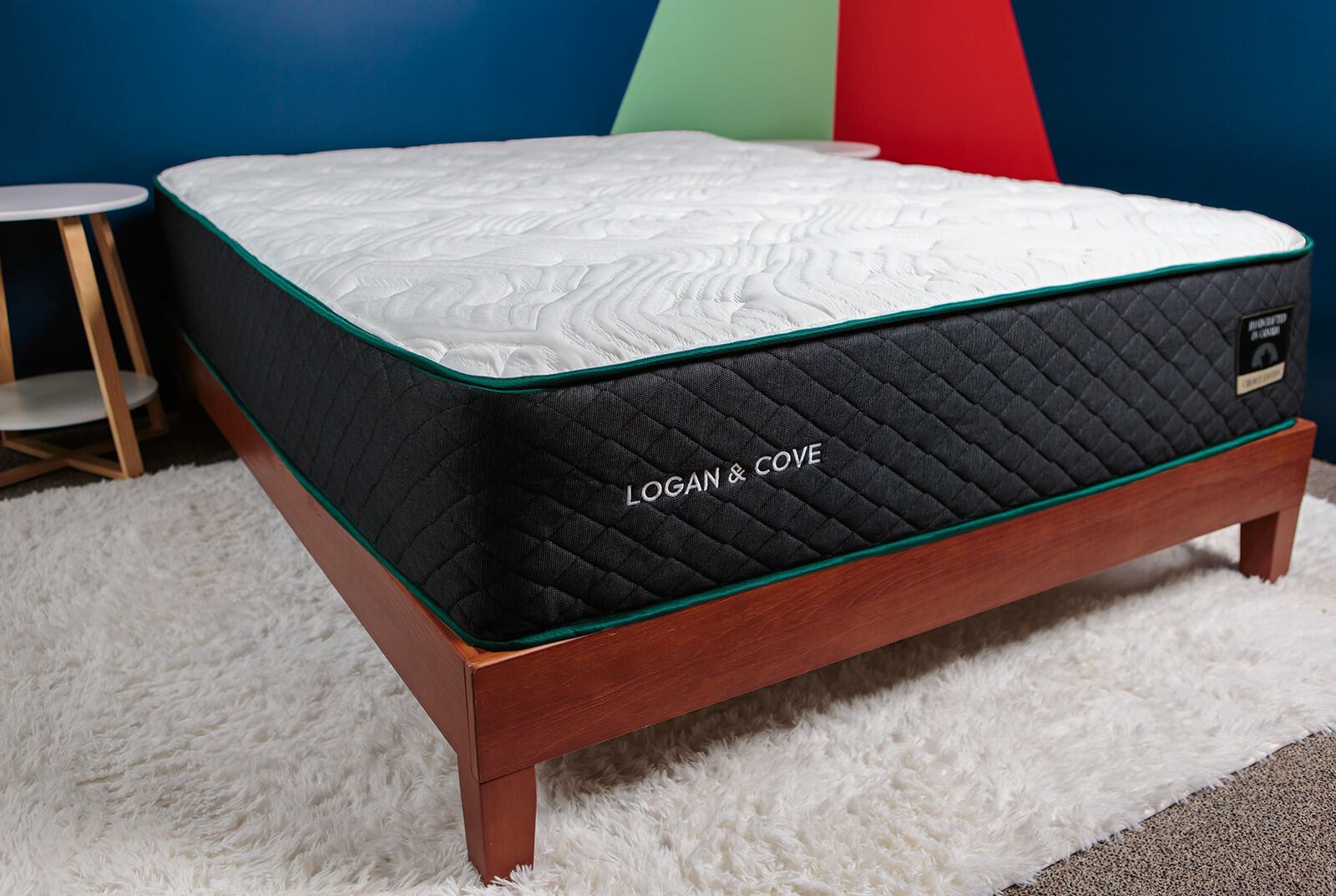 Photo of Logan Cove Choice mattress on a bed frame taken from an angle