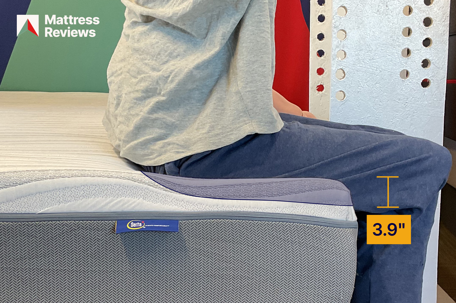 SertaChinookTest2EdgeSupport MattressReviewsca photo of a test dummy sitting on the edge of a Serta Chinook mattress to demonstrate edge support