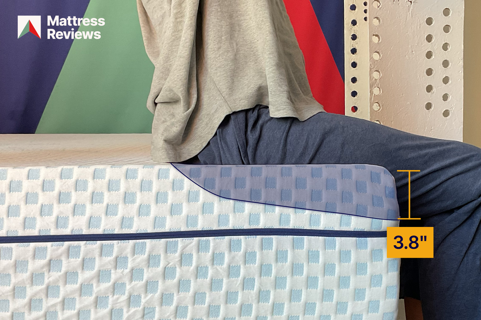 mannequin sitting on a bed showing 38