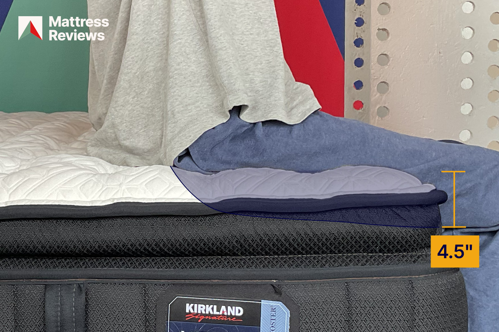 StearnFosterLakeridgeTest2EdgeSupport MattressReviewsca mannequin sitting on a bed showing 45